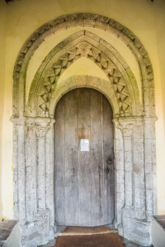 The unusual triple-arched doorway