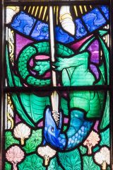 Llanidloes, St Idloes Church, St Michael slaying a dragon stained glass