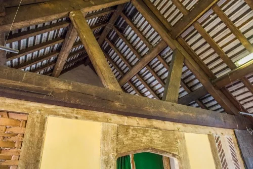 The timber-framed roof beams