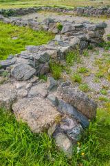A closeup of the foundation walls