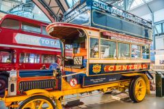A early motorised double-decker bus