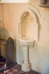 The 12th century pillar piscina