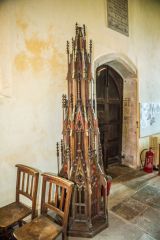 The ornate Victorian font cover