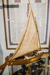 Model of a gaff-rigged clinker-built dinghy