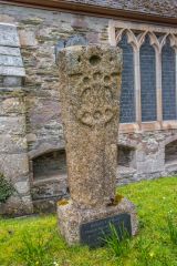 An ancient carved stone outside the church
