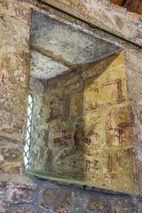 A deeply splayed Norman single lancet window