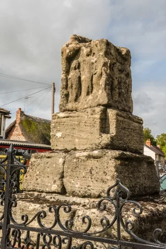 The cross and Victorian railings
