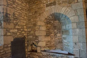 12th century blocked window and piscina