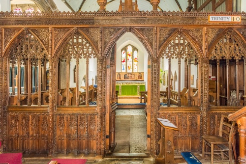 The superbly carved Tudor screen