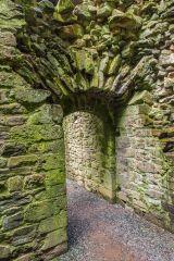 Arched doorway through the castle's interior dividing wall