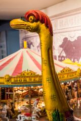 A life-sized ostrich fairground galloper