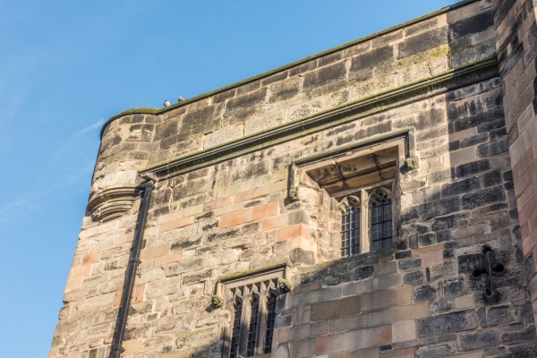 15th-century windows over the archway