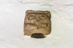 Beakhead corbel over the south door