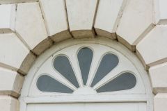 A fan light over the north door