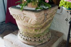 The beautifully carved Norman font