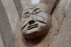 Grotesque medieval carved head