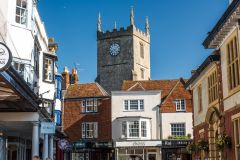 The tower of St Mary's over the rooftops of Kingsbury Street