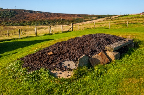 Peat drying in front of the cottage