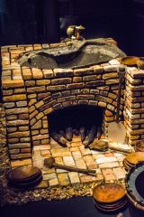 A salvaged cauldron and reconstructed hearth