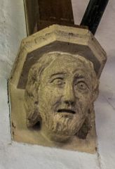 Carved corbel head of a man