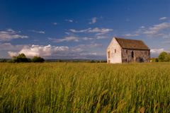The Fish House across a farm field