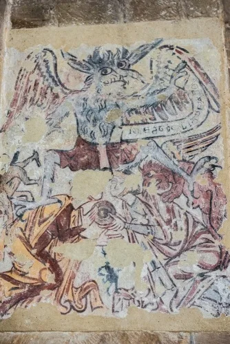 13th-century wall painting of a demon and arguing women