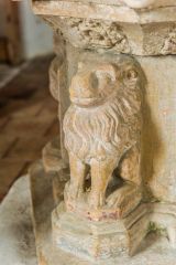 A lion on the font stem