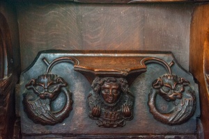 Misericord of an Angel wearing feathers