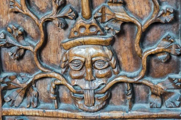 Green Man bench end carving