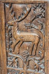 Bench end depicting a stag