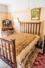 One of the bachelor brother's bedrooms