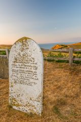 A 19th-century gravestone overlooking the coast