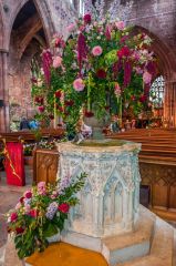 The beautifully carved medieval font