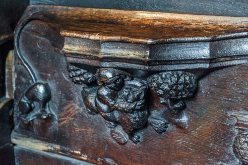 Misericord of Samson riding a lion