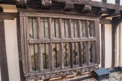 A beautifully carved mullioned window