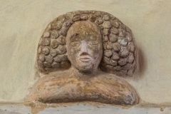 Carved head of a woman