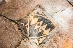 Medieval floor tile with De Ralegh family shield
