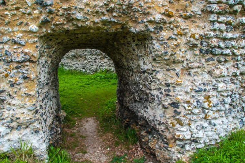 A worn doorway into the keep