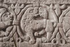 Figure of a lion on the font bowl