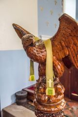The richly carved 19th century eagle lectern