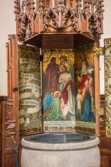 The ornately carved font cover in St Mary's church