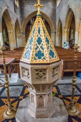 The beautifully carved font, c. 1400