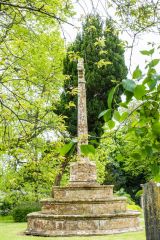 The restored 14th-century churchyard cross