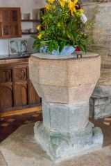 The simply carved Norman font