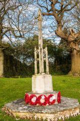 The village war memorial on the green