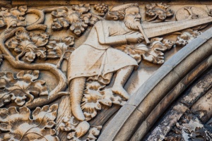 Armed figure, archway spandrel