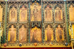 The richly-coloured 19th-century reredos