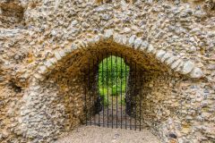 A low, arched doorway opening