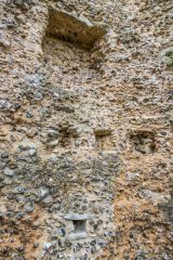 Empty joist holes and a fireplace