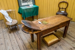 The operating table with sawdust for absorbing blood